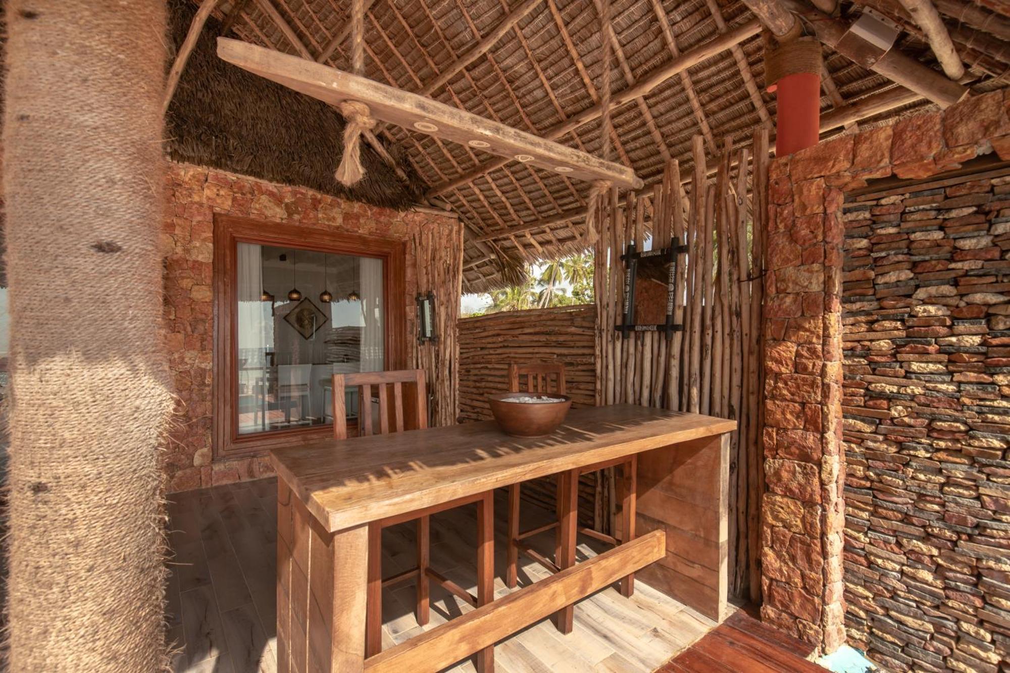 Kiwengwa Beach Resort Exterior photo Interior of a hut at the Ngorongoro Conservation Area