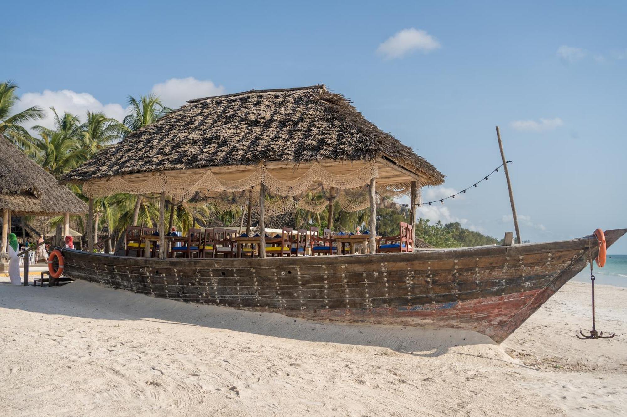 Kiwengwa Beach Resort Exterior photo A beach bar in Mozambique